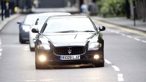 Find The Greatest Four-Door Supercar By Driving Wedding Guests