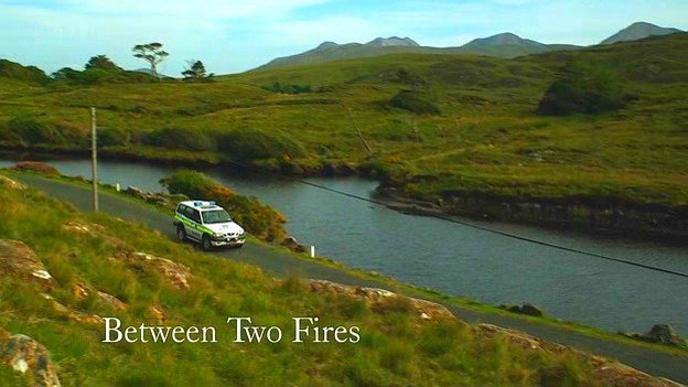 Between Two Fires